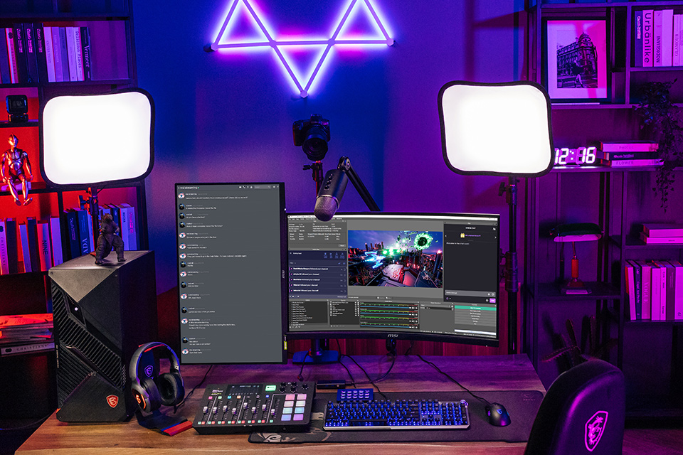 A gaming benchmark studio with multiple monitor displays logging frame timing data